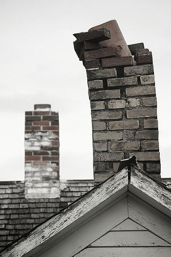 A Chicago broken chimney in need of repair by RK Masonry.